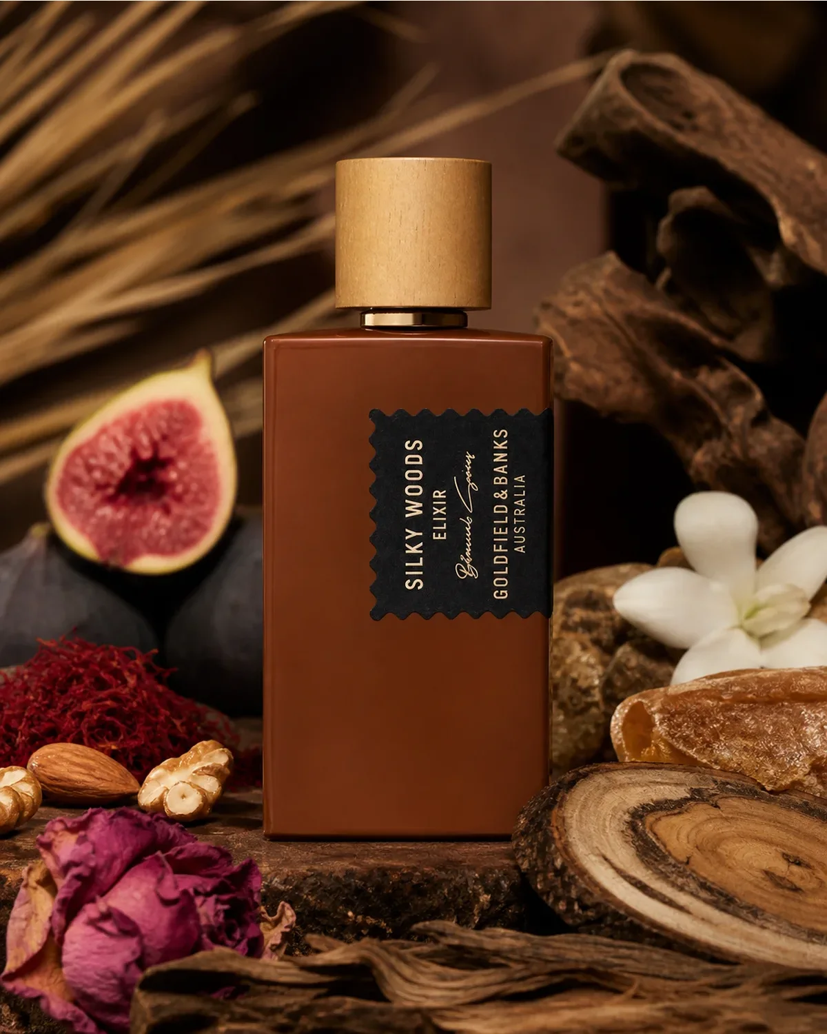 GOLDFIELD & BANKS SILKY WOODS ELIXIR EXTRAIT DE PARFUM 100ml fragrance bottle in a scent-inspired setting