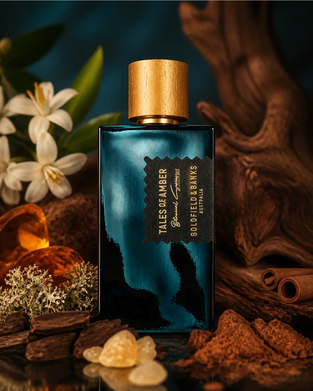GOLDFIELD & BANKS TALES OF AMBER EXTRAIT DE PARFUM 100ml fragrance bottle in a scent-inspired setting